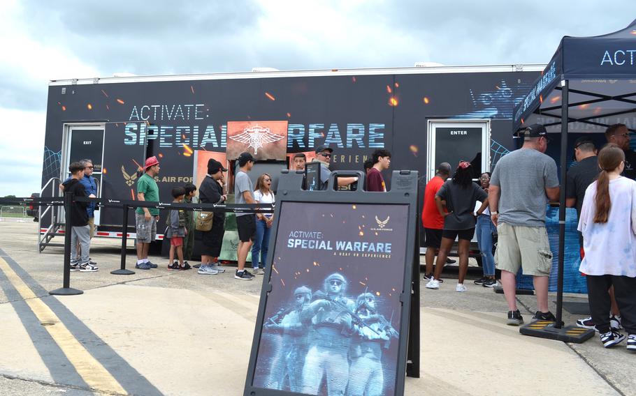 People line up April 6, 2024, to try a virtual reality simulation of Air Force Special Warfare troops at the Great Texas Air Show at Joint Base San Antonio-Randolph Air Force Base in Texas. 