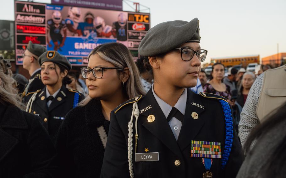 Sisters Daniela, 19, and Joseline Leyva, 18, wait to take part in Tyler High School’s senior night at Christus Trinity Mother Frances Rose Stadium in Tyler, Tex., on Nov. 3, 2023. 