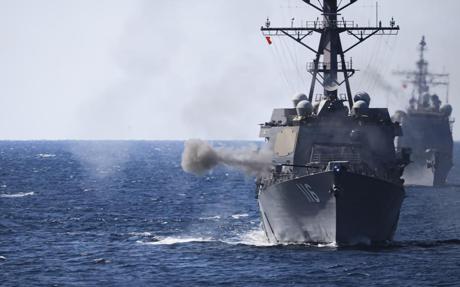 The USS Thomas Hudner, an Arleigh Burke-class guided missile destroyer, fires during training March 30, 2023, in the Atlantic Ocean. 