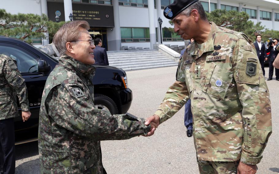 Then-U.S. Forces Korea commander Gen. Vincent Brooks greets South Korean President Moon Jae-in at Yongsan Garrison, South Korea, June 13, 2017. 