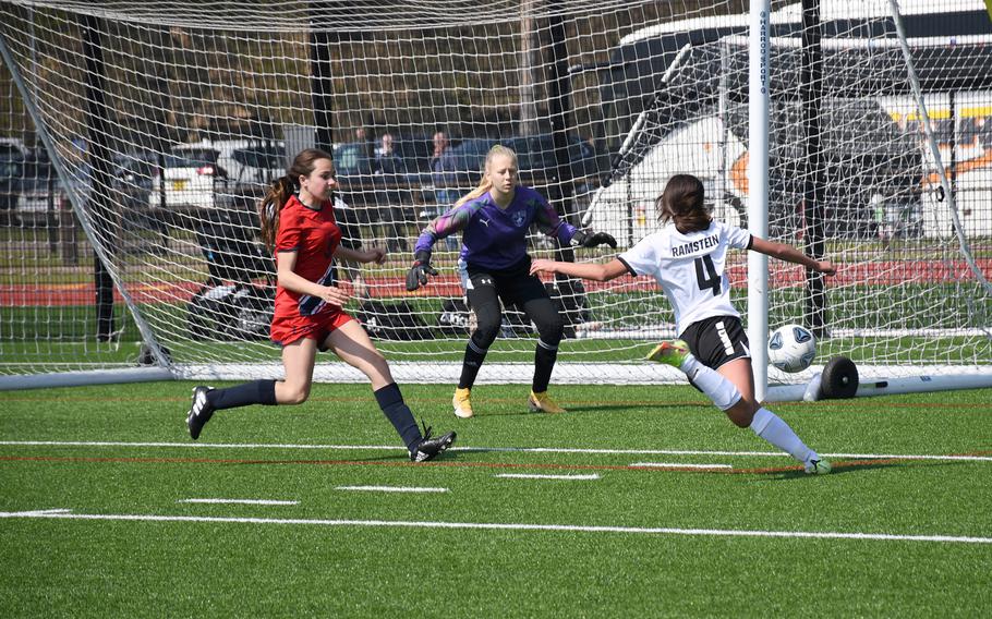 Ramstein's Isabel Fischer takes a shot on Lakenheath's goal, defended by Lancers’ goalkeeper Chloe Aldrich on Saturday, April 16, 2022. Fischer led the Royals on offense, scoring two goals.