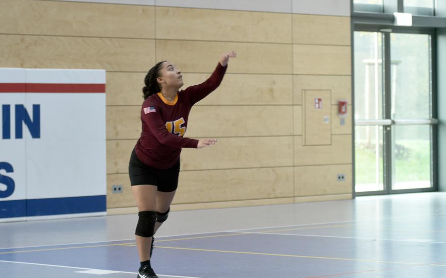 Vilseck's Kaylani Sandoval serves during a match against Lakenheath on Thursday during the DODEA European volleyball championships at Ramstein High School on Ramstein Air Base, Germany.

Matt Wagner/Stars and Stripes