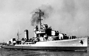 A black and white photo of a WWII-era warship.