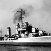 A black and white photo of a WWII-era warship.