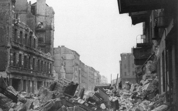 Wreckage and debris fill a street in Berlin on July 31, 1945.