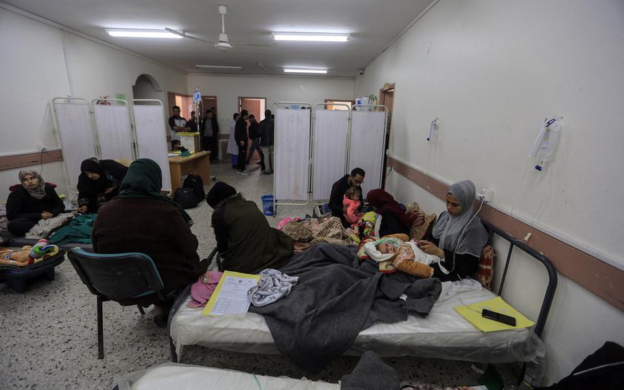 Palestinians children receive treatment on March 2, 2024, at a private children’s hospital in the city of Rafah, which specializes in providing care to children who suffer from malnutrition and a shortage of medication. 