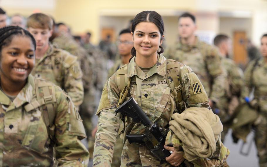 Army Spc. Brodi Curry, an intelligence analyst with the 3rd Battalion, 69th Armored Regiment of the 3rd Infantry Division’s 1st Armored Brigade Combat Team, prepares to deploy for the first time as a soldier on Tuesday, March 2, 2022, at Hunter Army Airfield, Ga. 