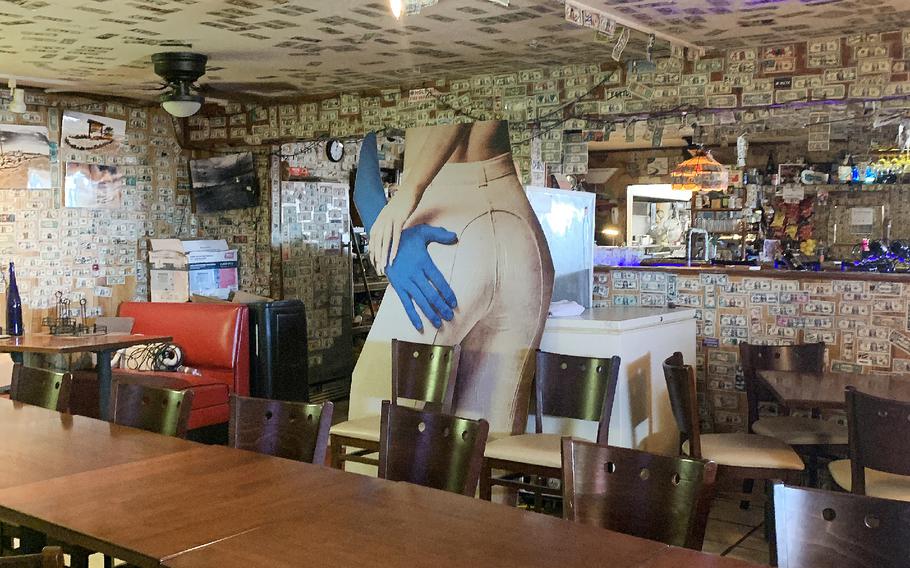 The Ski Inn, a dive bar and restaurant that features $1 bills scribbled with names and dates, is seen in in Bombay Beach, Calif. on Oct. 22, 2021. 