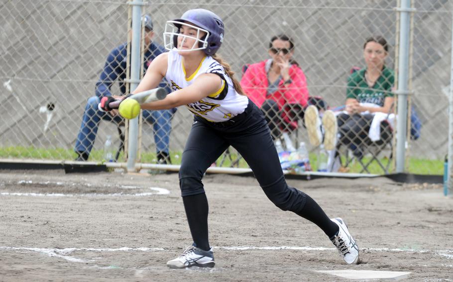 Kadena sophomore Jessica Petruff executes one of her three successful squeeze bunts against Yokota.