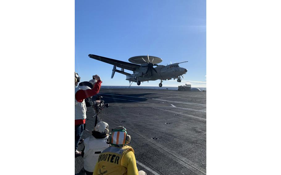 An Airborne early warning and control plane, or AWACS, lands on the USS Harry S. Truman in the Adriatic Sea on Wednesday, Feb. 2, 2022. 