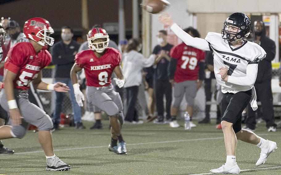 Zama's Dominic Peruccio lets go a pass against Kinnick.