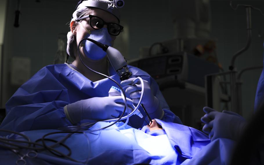 Army Dr. (Lt. Col.) Jessica Peck performs an intranasal cryotherapy procedure at Landstuhl Regional Medical Center, April 23, 2021. The procedure freezes nerves in the back of the nose to treat allergy-like symptoms which last more than a month.

Marcy Sanchez/U.S. Army