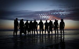 Soldiers with U.S. Army's 10th Special Forces Group pose for a photo after a maritime training exercise near Astoria, Oregon in 2016. A judge in Washington state sided with public opposition to the Navy using public parks along the Columbia River for SEAL training, but Army Green Berets have trained across the river in Oregon for decades with little public notice.