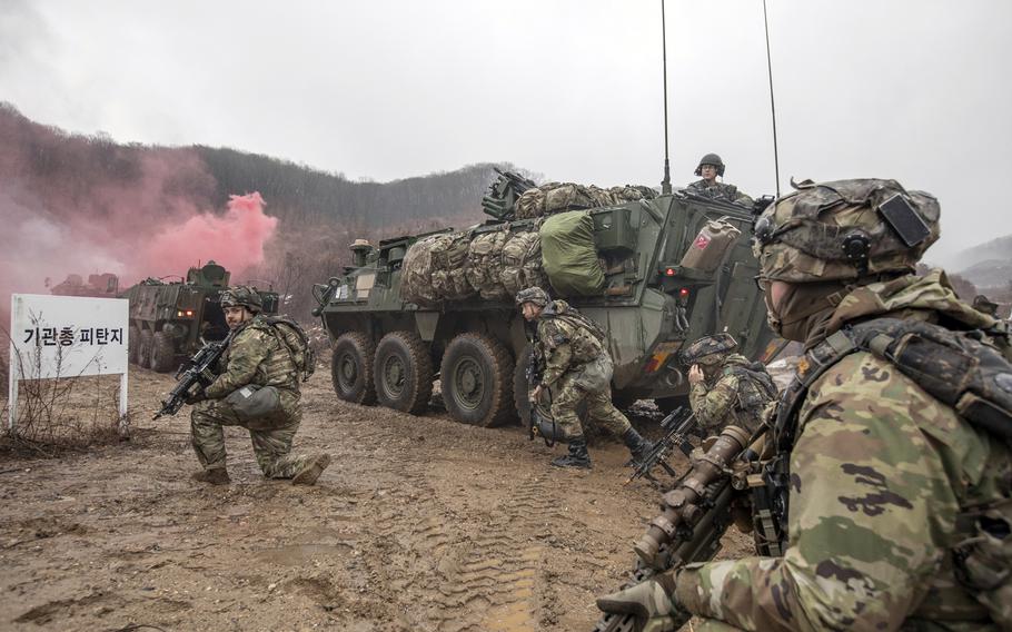 Soldiers from the 2nd Infantry Division and South Korea’s Tiger Demonstration Brigade train using Strykers and K808 White Tiger infantry fighting vehicles at Mugeonri Training Field in Paju, South Korea, Friday, Jan. 13, 2023. 