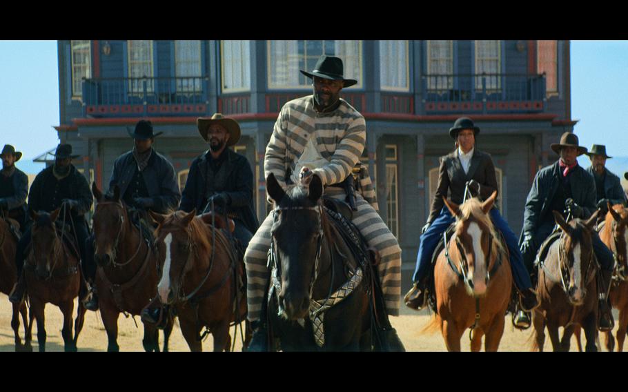 “The Harder They Fall” (l to r) (4th from left): Delroy Lindo as Bass Reeves, Idris Elba as Rufus Buck, and Regina King as Trudy Smith.