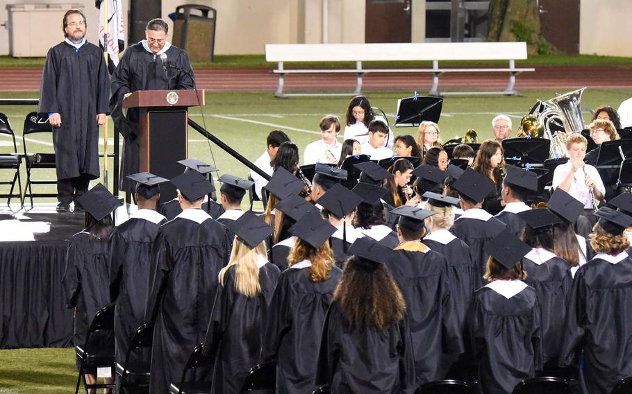 Zama Middle-High School principal Henry LeFebre opens the commencement ceremony on the school's athletic field at Camp Zama, Japan, Wednesday, May 23, 2023. 