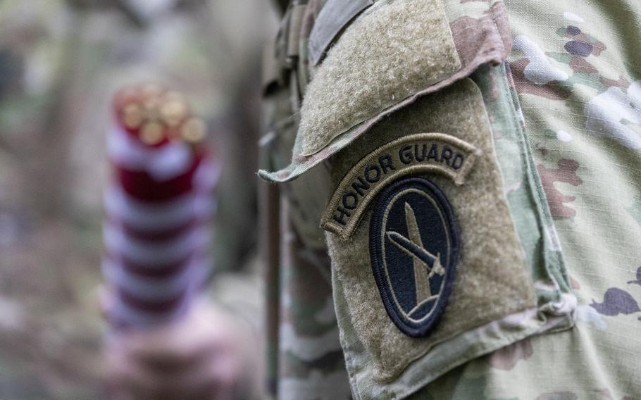 A patch on a soldier’s shoulder says Honor Guard.