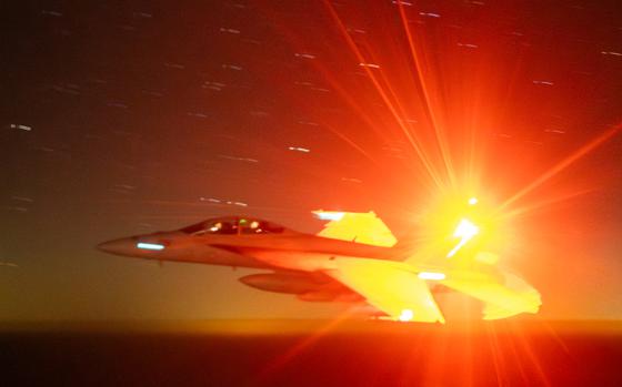 A U.S. Navy F/A-18 Super Hornet flies in the U.S. Central Command area of operations on March 23, 2025. The Super Hornet, attached to Strike Fighter Squadron 143, is part of a large-scale operation against Iran-backed Houthis to restore freedom of navigation in the Red Sea.