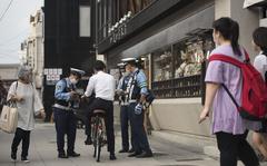 An advisory from Japan’s National Police Agency said officers should avoid questioning people in a manner that may be perceived as racial profiling.