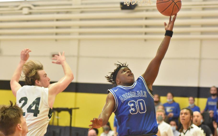 Naples' Kennith Bryant scores the go-ahead basket Saturday, March 5, 2022, as the Admirals rallied past the Naples Wildcats to win the DODEA-Europe Division II boys championship.