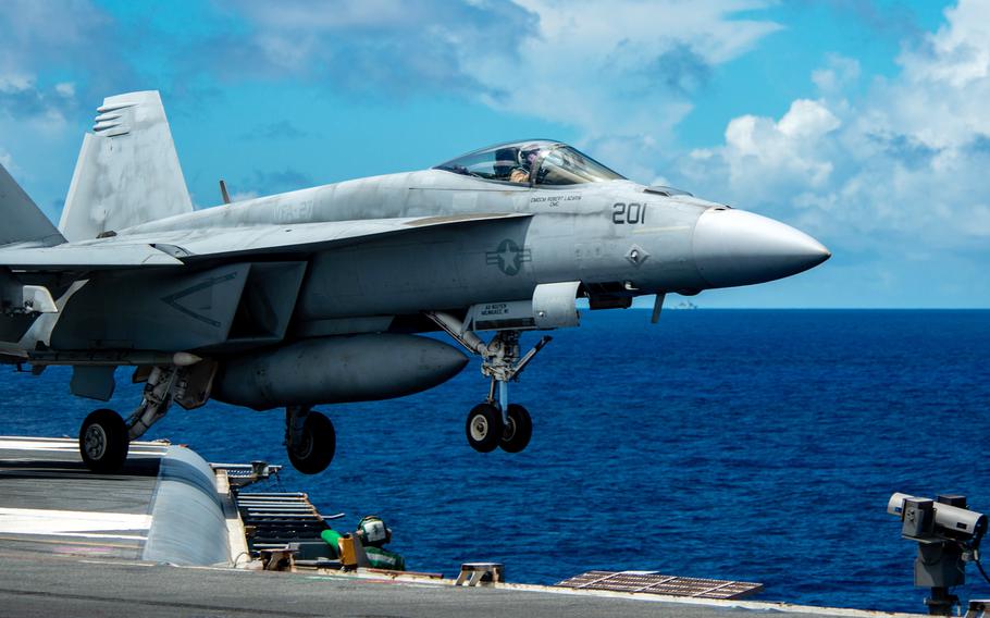 An F/A-18E Super Hornet launches from the flight deck of the aircraft carrier USS Ronald Reagan in the Philippine Sea, June 21, 2022.