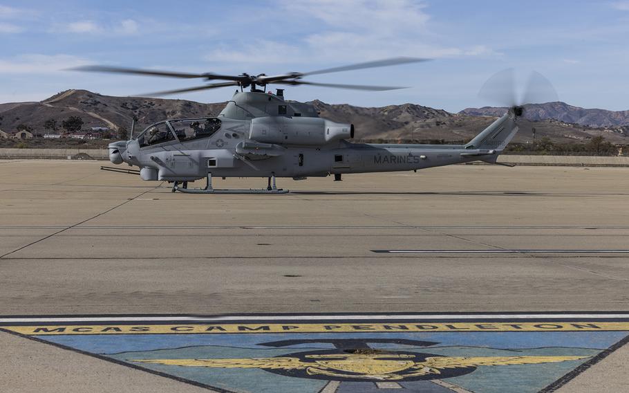 U.S. Marine Corps Col. Nathan “MOG” Marvel, commanding officer of Marine Aircraft Group (MAG) 39, 3rd Marine Aircraft Wing (MAW), lands the final AH-1Z Viper produced for the Marine Corps on Marine Corps Air Station Camp Pendleton, California, Nov. 4, 2022. 