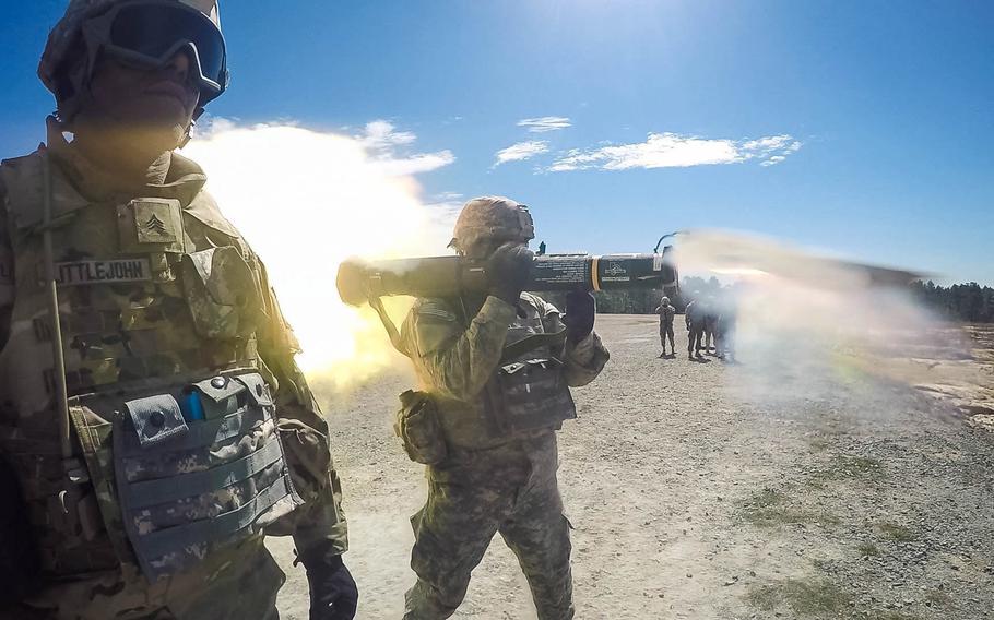 Back blast from a M136 AT4 rocket launcher creates a heat wave as a soldier the 82nd Combat Aviation Brigade fires the weapon at Fort Bragg, N.C., March 17, 2017.