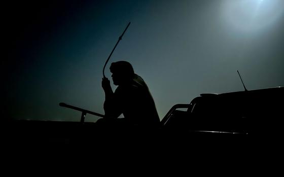 An airman uses a handheld radio in the Middle East on June 6, 2025. Cobalt is an important ingredient in battery technology, including those in tactical radios. The U.S. wants to add $500 million worth of the metal to its strategic stockpile.
