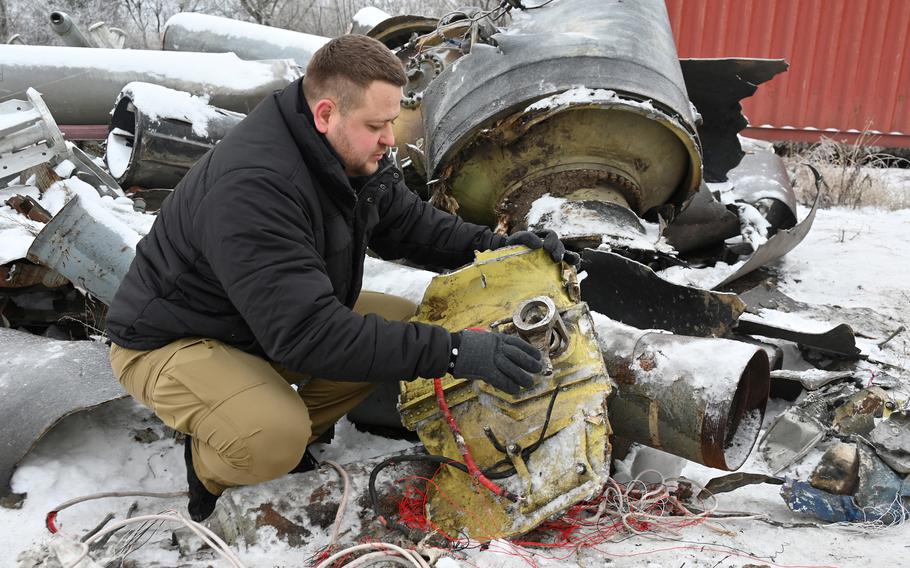 On Jan. 6, 2024, a prosecutor's office expert inspects remains of a missile used during a Jan. 2 attack on Kharkiv, Ukraine.