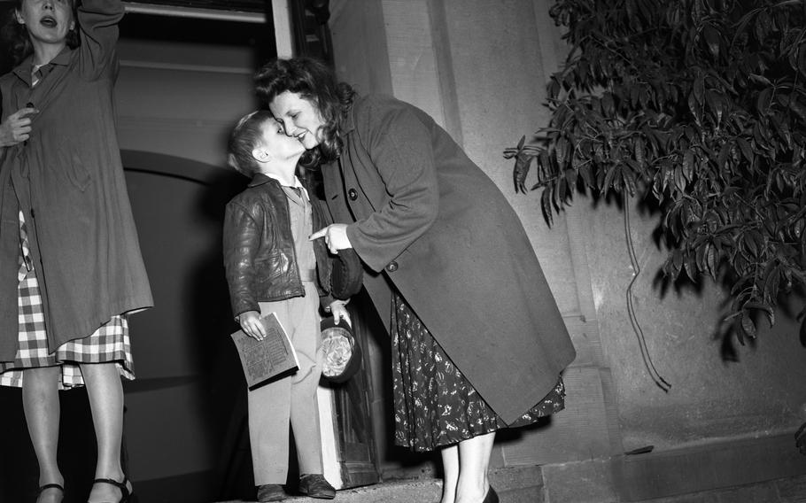 Wayne Nicolosi gives a goodbye kiss to his mom, who walked the children to the Heidelberg dependents’ school Sept. 7, 1948. 