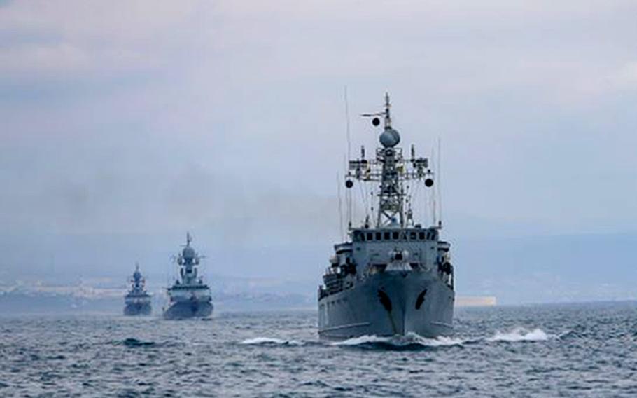 Ships of the Russian Black Sea Fleet train during an exercise in the sea in April 2021. Secretary-General Jens Stoltenberg said in a meeting in Brussels, May 25, 2021, that Russia continues to restrict navigation in the Black Sea, including near the Kerch Strait, which has been a flashpoint for Russian and Ukrainian warships.  