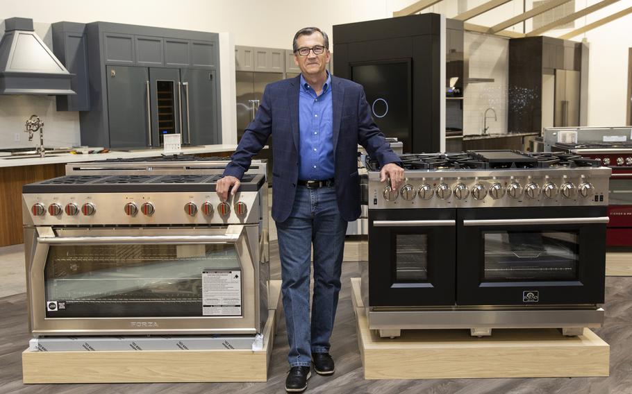 Guy Minnix, the General Manager of FACETS, a home appliance store in Dallas, is pictured on June 24. One problem can knock out the whole supply chain: For example, during the Texas freeze and massive power outages, the factory making foam for refrigerator doors had to halt production, meaning an even longer wait for appliances. 
