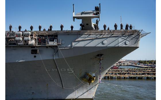 The Wasp-class amphibious assault ship USS Bataan (LHD 5), assigned to the Bataan Amphibious Ready Group (ARG), returns to Naval Station Norfolk following an eight and a half-month deployment operating in the U.S. 5th and U.S. 6th Fleet areas of operation, March 21, 2024. More than 4,000 Sailors and Marines assigned to the Bataan ARG supported a wide range of interoperability opportunities and exercises, increasing combat readiness and crisis response capabilities while strengthening relationships with NATO Allies and partners. (U.S. Navy photo by Mass Communication Specialist 2nd Class Anderson W. Branch)