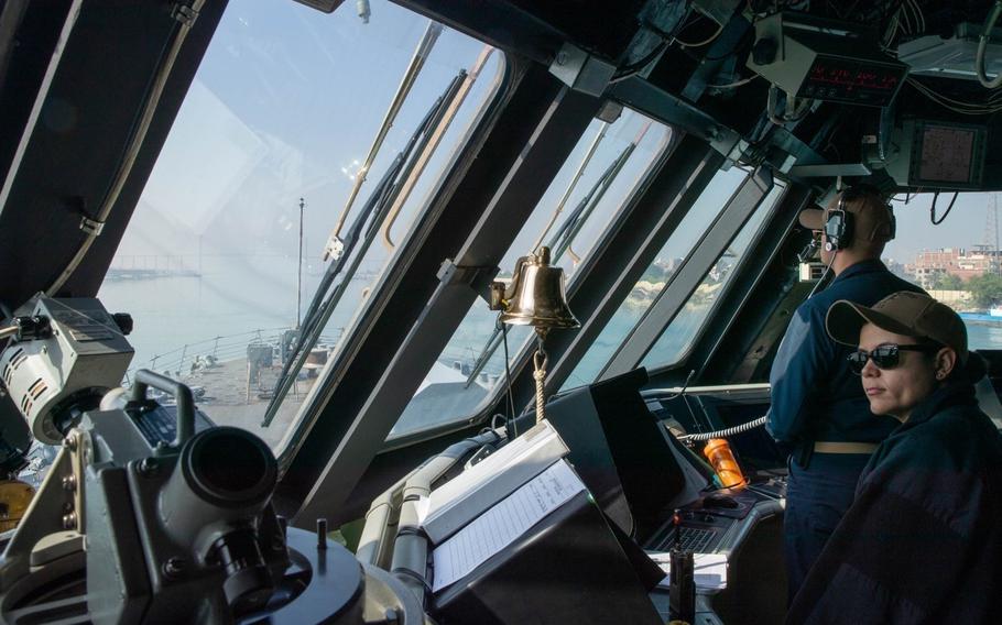Sailors assigned to littoral combat ship USS Sioux City stand watch in the bridge while transiting the Suez Canal, May 29, 2022. Sioux City is deployed to the U.S. 5th Fleet area of operations to help ensure maritime security and stability in the Middle East region. 
