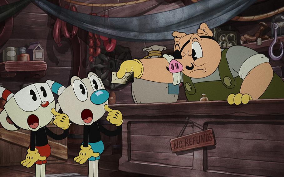 From left to right: Tru Valentino as Cuphead, Frank Todaro as Mugman and Cosmo Segurson as Porkrind in “The Cuphead Show!” 