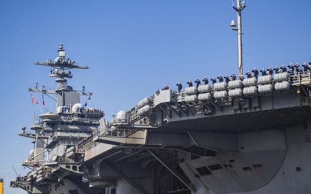 241220-N-VD554-1215 NAVAL AIR STATION NORTH ISLAND, Calif. (Dec. 20, 2024) – Sailors salute aboard Nimitz-class aircraft carrier USS Abraham Lincoln (CVN 72) as they arrive at Naval Air Station North Island, Calif., Dec. 20, 2024. Lincoln returned home from a 5-month deployment as part of Carrier Strike Group (CSG) 3 in the U.S. 5th Fleet and 7th Fleet area of operations. (U.S. Navy photo by Mass Communication Specialist 1st Class Aron Montano)