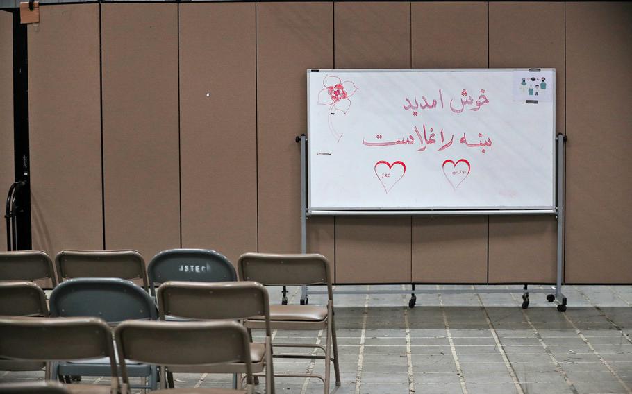 A translated welcome sign is ready to greet evacuees at the IRC as part of Operation Allies Welcome, Thursday, Oct. 14, 2021, at Camp Atterbury in Edinburgh, Ind.