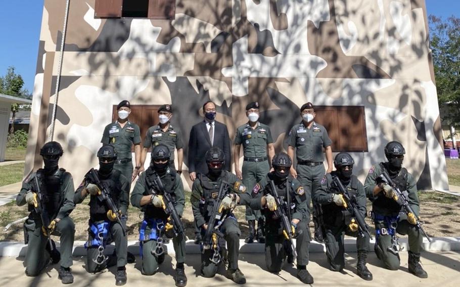 U.S. Embassy Chargé d’Affaires Michael Heath poses with Thai Border Patrol police at the unveiling of a $600,000 training facility in Mae Taeng, Thailand, Jan. 28, 2022. 