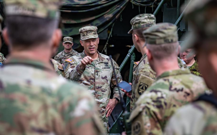 Lt. Gen. John S. Kolasheski, commander of V Corps, speaks with Army leaders during the European Rocket Artillery Summit in Torun, Poland, April 18, 2023. 