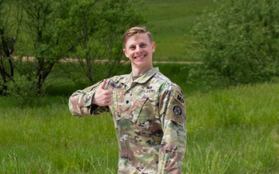A photo of Spc. Joseph Breining smiling and giving a thumbs-up has spurred the creation of memes.