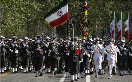 Iranian army members march during an Army Day parade at a military base in northern Tehran, Iran, on April 17, 2024.