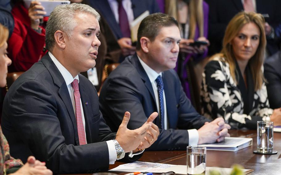 Colombian President Ivan Duque Marquez speaks during his meeting with President Joe Biden in the Cabinet Room of the White House, Thursday, March 10, 2022, in Washington.