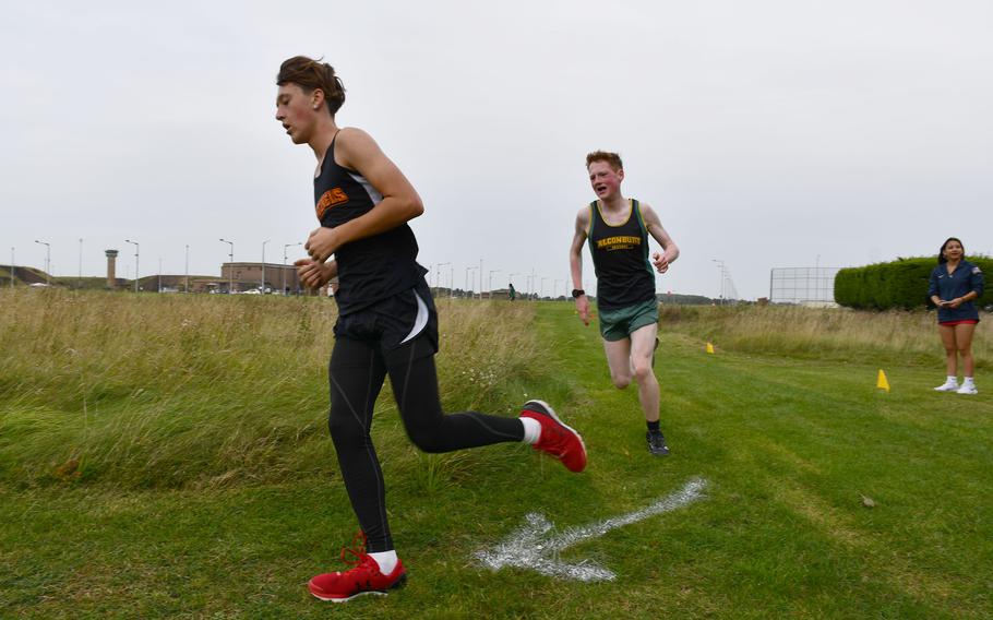 Spangdahlem Sentinel Parker Valdivia leads Alconbury Dragon Ben Wilson on the back half of the 5-kilometer race hosted at RAF Molesworth on Saturday.