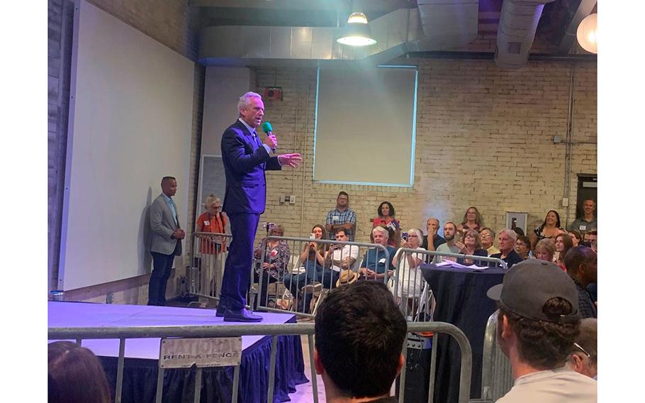 Robert Kennedy Jr., who is challenging President Joe Biden for the Democratic nomination in the 2024 election speaks to a crowd at Zen Greenville on Aug. 21, 2023.