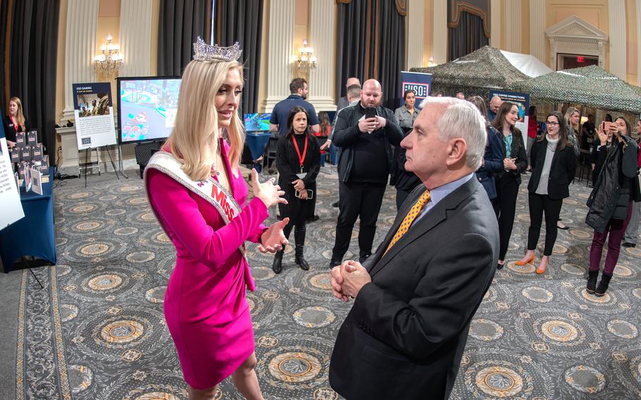 Miss America Madison Marsh, also a second lieutenant in the Air Force, speaks with Sen. Jack Reed, D-RI, the chairman of the Senate Armed Services Committee during a USO presentation at the House Cannon office building in Washington, D.C., on Tuesday, Feb. 6, 2024.