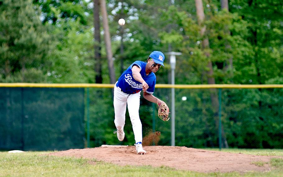Ramstein pitcher Christian Roy throws to the plate during a Division I DODEA European baseball semifinal against Kaiserslautern on May 19, 2023, at Southside Fitness Center on Ramstein Air Base, Germany.