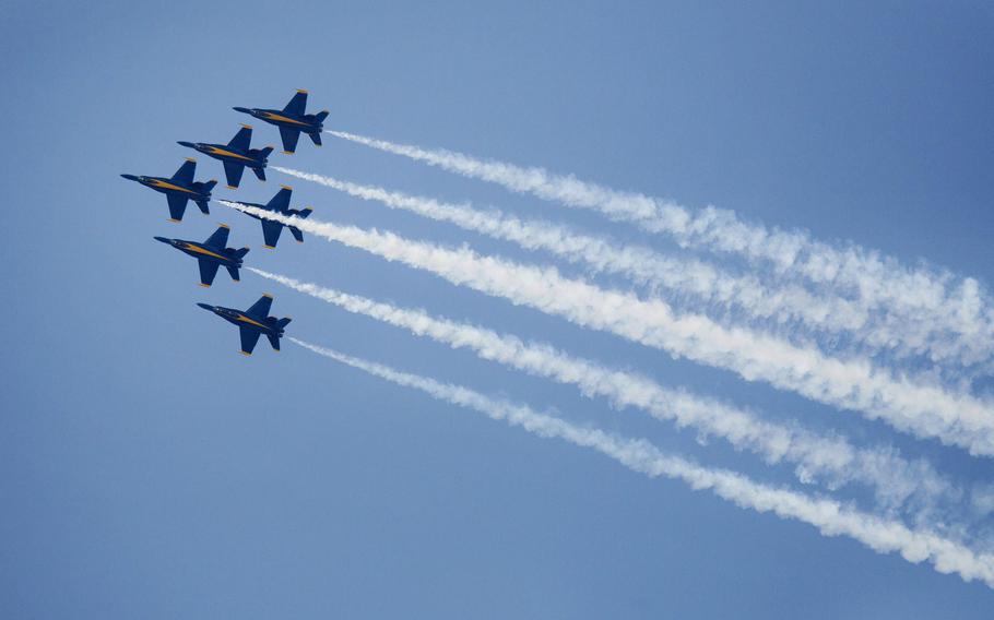 The Blue Angels take to the skies over Oceana Naval Air Station, during a practice run for the 2014 NAS Oceana Air Show.