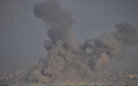 Smoke from an explosion rises,