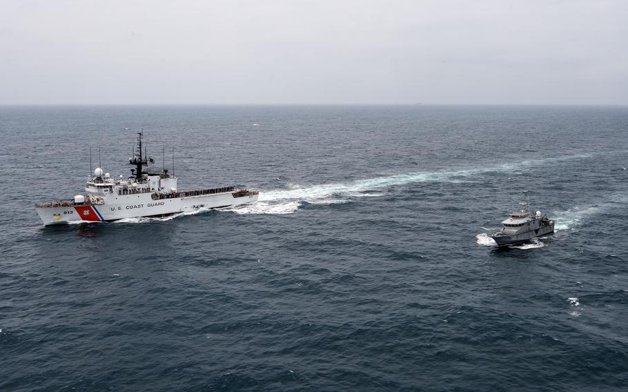 USCGC Mohawk sails alongside a Nigerian navy ship in the Atlantic Ocean, Aug. 22, 2022. Mohawk is on a scheduled deployment in the U.S. Naval Forces Africa area of operations.