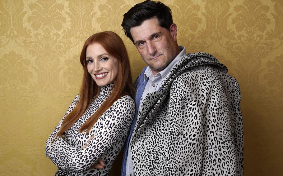 Jessica Chastain, left, the star of "The Eyes of Tammy Faye," poses for a portrait with director Michael Showalter during the 2021 Toronto International Film Festival on Sunday at the Royal Fairmont York in Toronto. 